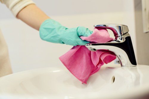 Local cleaner preparing a guest-ready apartment in Lambeth